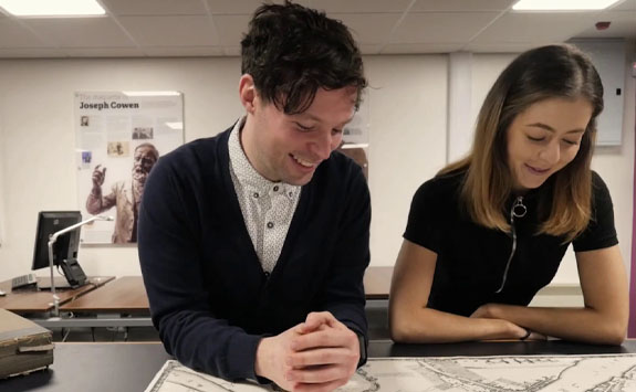 Students using archives in the Reading Room